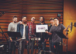 Linkin Park with Heavy sign